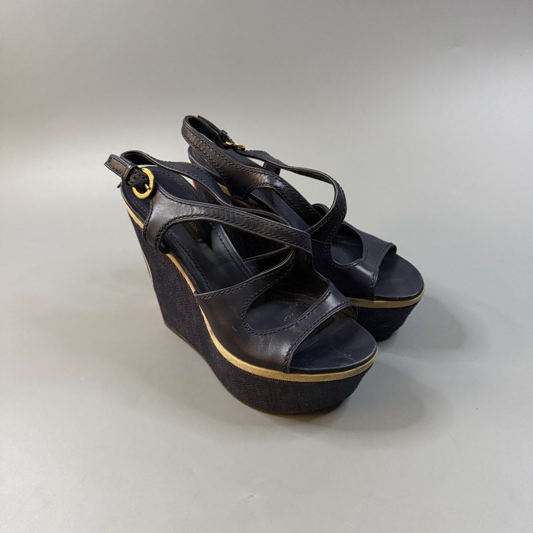 (Authentic) Louis Vuitton - Criss Cross Wedge Platform Ankle Strap Sandals (Category: Wedges) located in Paranaque City. Submitted by millennial_goodz (Listing ID 1468011886, Image 2). Description: WTS (Authentic) Louis Vuitton - Criss Cross Wedge Platform Ankle Strap Sandals Size 36 Very good condition Signs of usage (see photos) Authentic, pair only P2,999 only DM.
