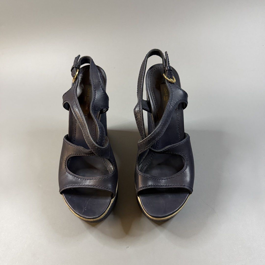(Authentic) Louis Vuitton - Criss Cross Wedge Platform Ankle Strap Sandals (Category: Wedges) located in Paranaque City. Submitted by millennial_goodz (Listing ID 1468011886, Image 3). Description: WTS (Authentic) Louis Vuitton - Criss Cross Wedge Platform Ankle Strap Sandals Size 36 Very good condition Signs of usage (see photos) Authentic, pair only P2,999 only DM.