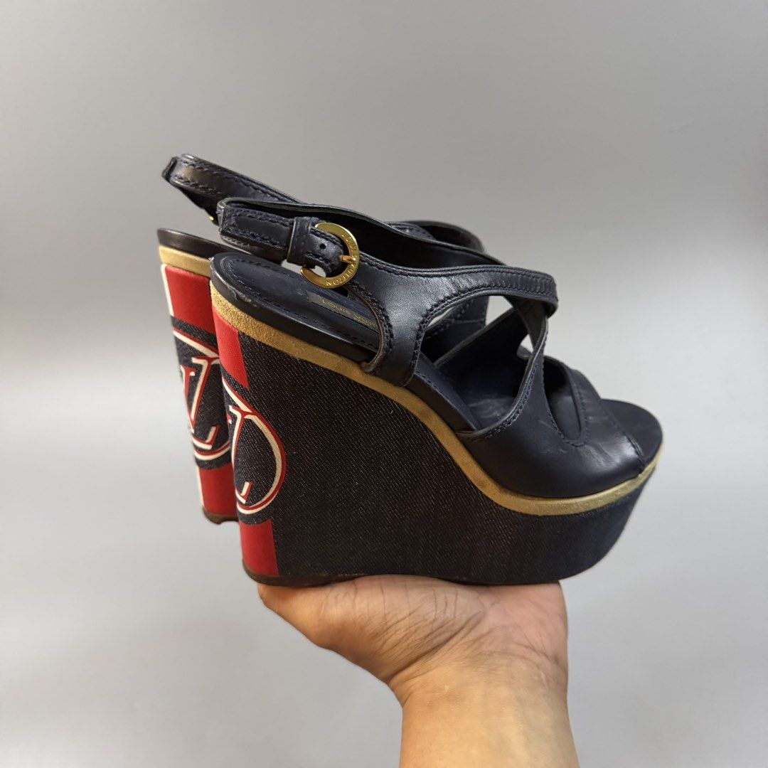 (Authentic) Louis Vuitton - Criss Cross Wedge Platform Ankle Strap Sandals (Category: Wedges) located in Paranaque City. Submitted by millennial_goodz (Listing ID 1468011886, Image 1). Description: WTS (Authentic) Louis Vuitton - Criss Cross Wedge Platform Ankle Strap Sandals Size 36 Very good condition Signs of usage (see photos) Authentic, pair only P2,999 only DM.