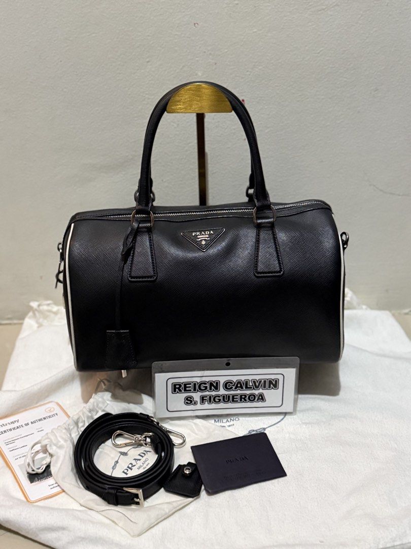 Authentic Prada 2-way saffiano (Category: Cross-body Bags) located in Manila. Submitted by reg08 (Listing ID 1468053776, Image 1). Description: With coa Dustbag.
