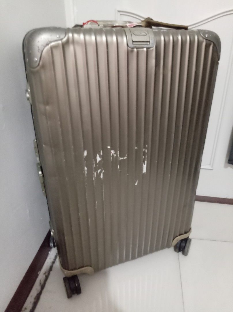 Authentic Rimowa Luggage 30' (Category: Luggage) located in Cavite. Submitted by petmail (Listing ID 1468041065, Image 2). Description: Preowned and well loved Rimowa 30' Check in Luggage Super Durable, smooth & effective! Kindly contact +63 9614 888 888 for further information & pick up @ Lancaster City, KS 22, Blk 20, Lot 10, General Trias, Cavite.