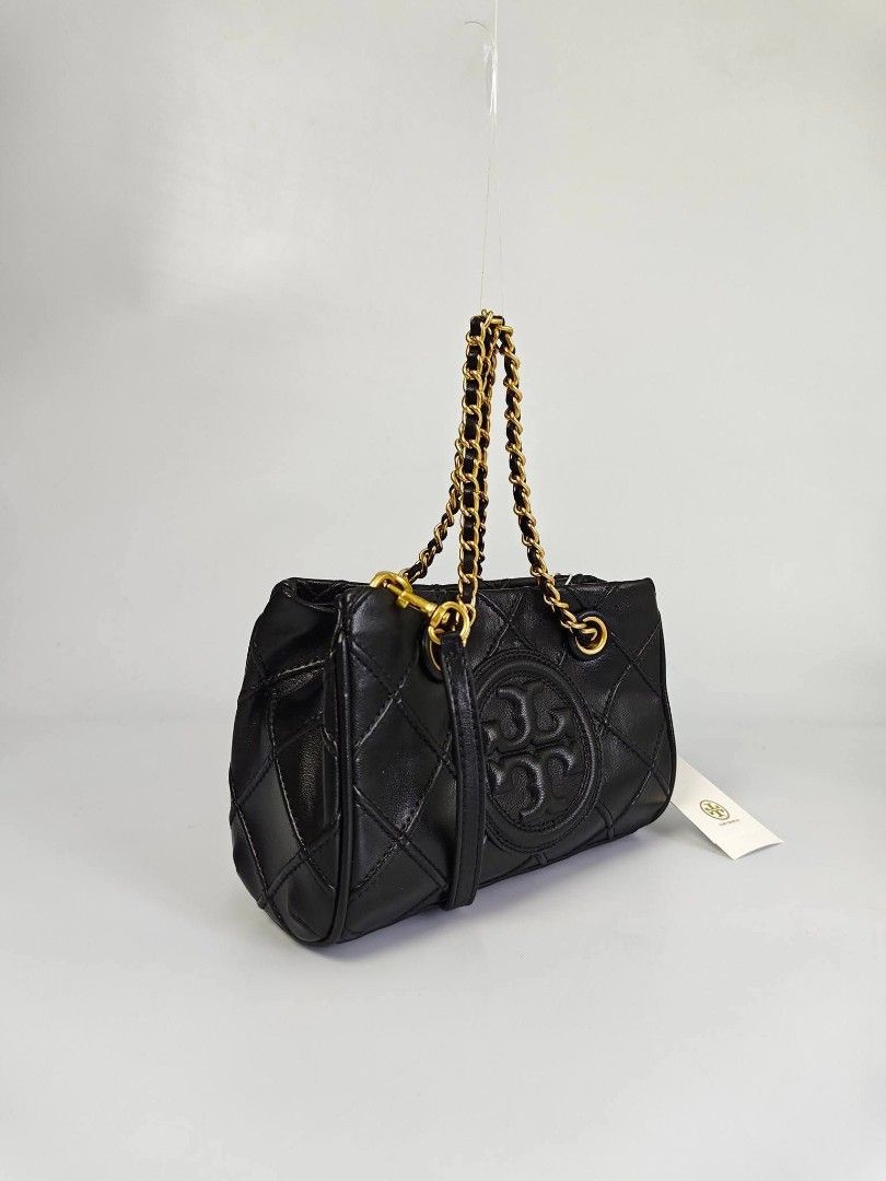 Authentic Tory Burch Black Quilted Leather Convertible Shoulder Bag (Category: Cross-body Bags) located in Quezon City. Submitted by hollowwillow (Listing ID 1467857666, Image 3). Description: 5,800 7.5"2 x 5.5"h x 4.5"d inches - Brand: Tory Burch - Color: Black with luxury gold-tone hardware - Material: Premium quilted leather - Signature Details: Embossed double T logo on the front - Straps: Double chain handles + adjustable, detachable leather