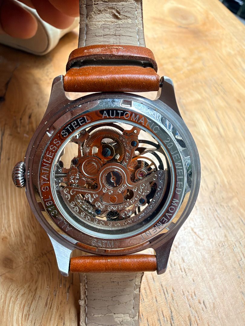 Automatic Skeleton Watch Heritor (Category: Men's Watches) located in Quezon City. Submitted by 30somethingtreasures (Listing ID 1467983938, Image 3). Description: - Brand: Heritor - Movement: Automatic, 20-jeweled with red jewel accents - Case: Silver-tone stainless steel with minor standard wear - Dial/Caseback: Transparent skeleton design - Strap: Brown leather.
