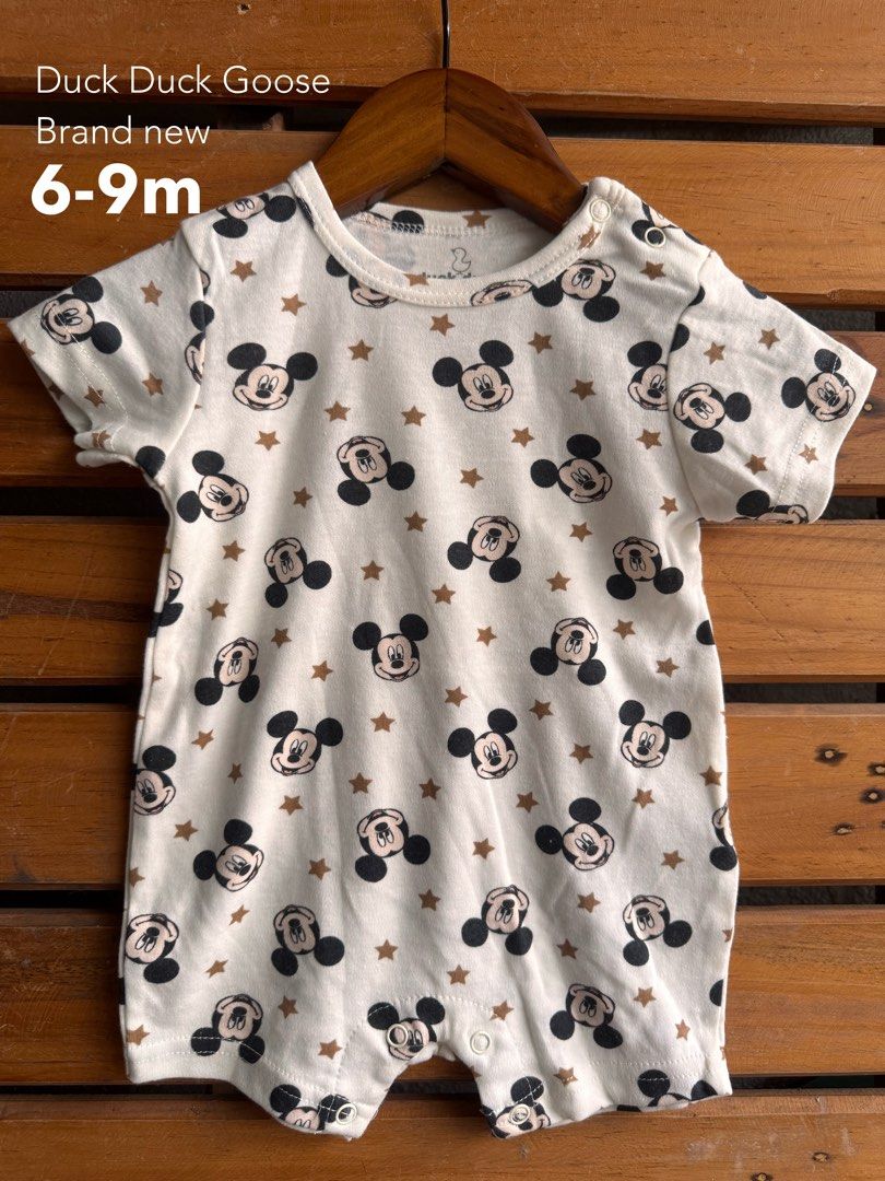 Baby Romper Assorted Brands Sizes 0-9m (Category: Babies & Kids Fashion) located in Santa Rosa. Submitted by yasss23 (Listing ID 1467981682, Image 2). Description: - Bundle of 5 comfortable baby rompers - Brands: Kidgets, Duck Duck Goose - Sizes: 0-3m, 3-6m, and 6-9m - Designs: Mickey Mouse, bear prints, stripes, and dinosaur pocket - Material: Soft 100% cotton - Features: Shoulder and bottom snaps for quick diaper changes - Condition: Great for 