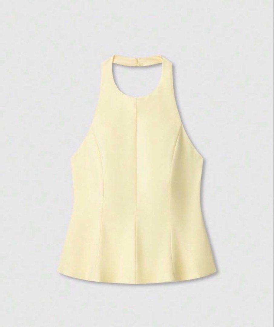 Backless Halter Peplum top in yellow (Category: Sleeveless) located in Paranaque City. Submitted by handledwcare (Listing ID 1467859279, Image 1). Description: .