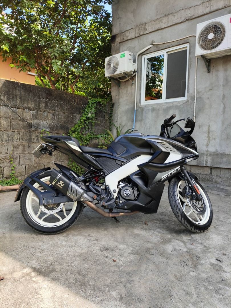 Bajaj Pulsar RS200 Motorcycle (Category: Motorbikes for Sale) located in Cabanatuan. Submitted by emieeeeeeee (Listing ID 1467895092, Image 2). Description: FOR SALE: 2020 Bajaj Pulsar RS200 (Purchased 2021) -------------------------------------- LOCATION: Cabanatuan, Nueva Ecija QUICK SPECS & DETAILS: Year Model: 2020 (Acquired 2021) Odometer: ~35,000 km Fuel Injected / 200cc Engine (Engine in top health, strictly used Shell Advance Long Ride oi