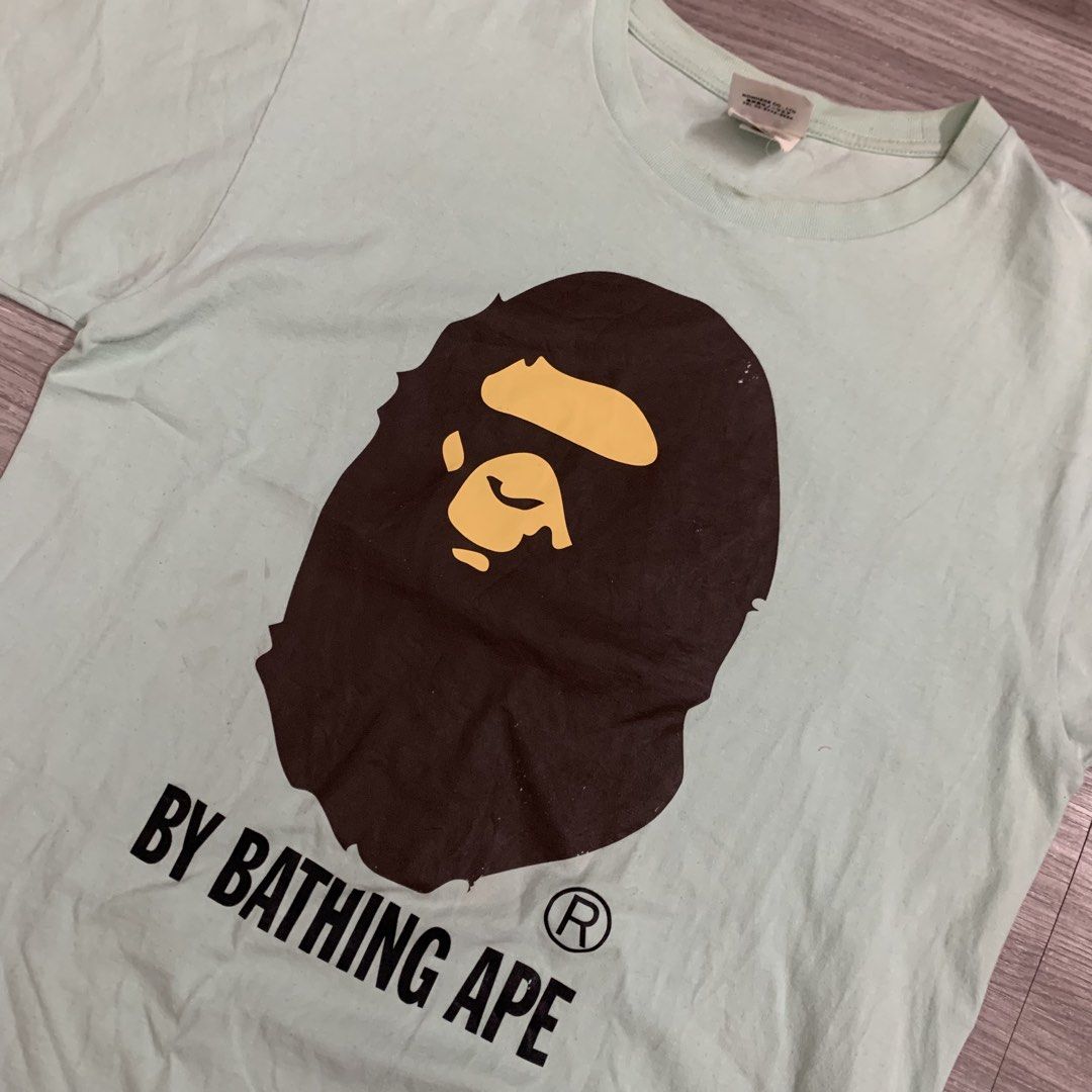 Bape bighead (Category: Tshirts & Polo Shirts ) located in Cavite. Submitted by yobubsss (Listing ID 1468050829, Image 2). Description: Size Large 21w 28L Good condition Issue scratch sa print see last 2pic washable stain sa neckline .