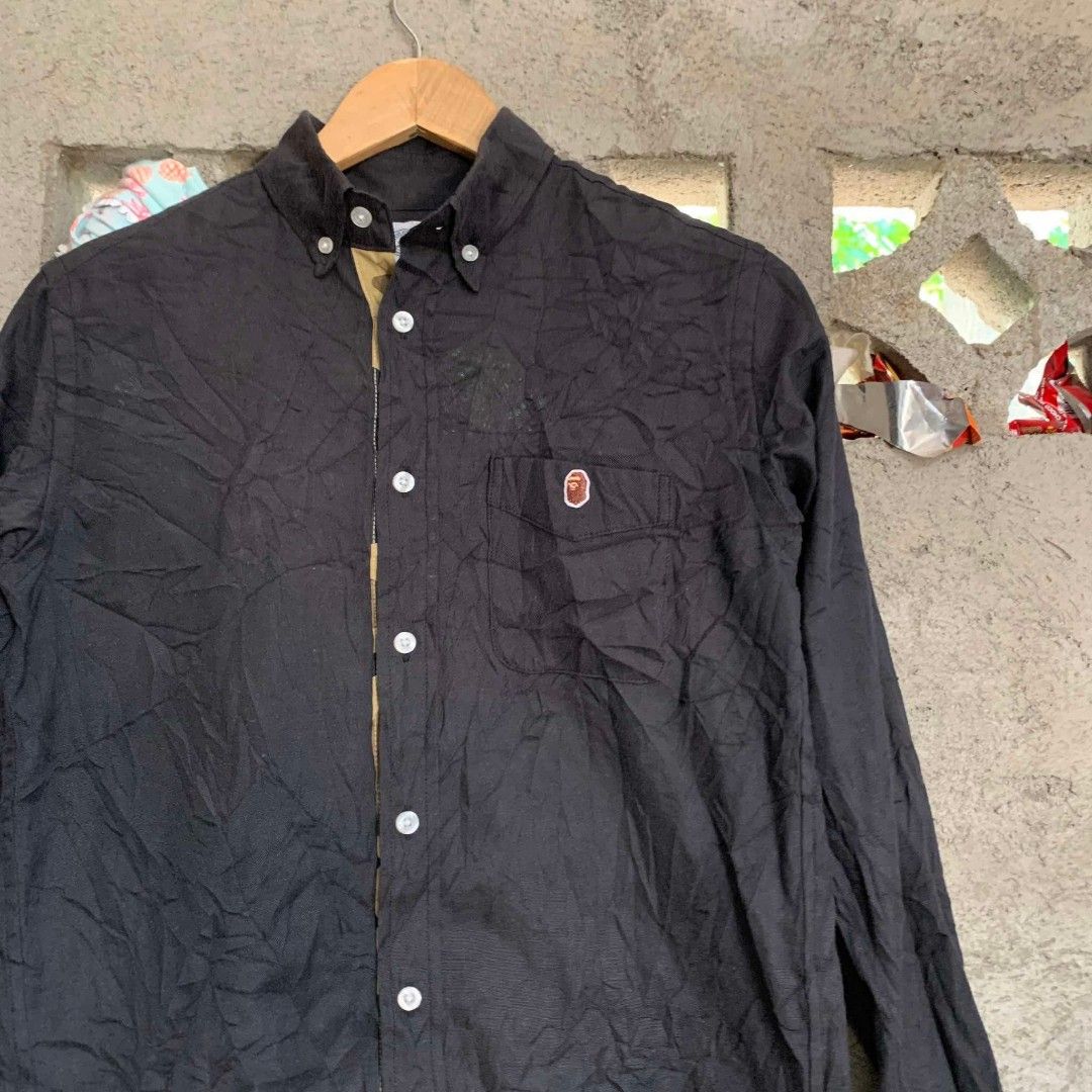 BAPE BUTTON DOWN (Category: Longsleeves) located in Cagayan de Oro. Submitted by mysticdolphin.62c23a (Listing ID 1467920273, Image 2). Description: BAPE BUTTON DOWN GOODASNEW NO ISSUE BLACK NA BLACK.