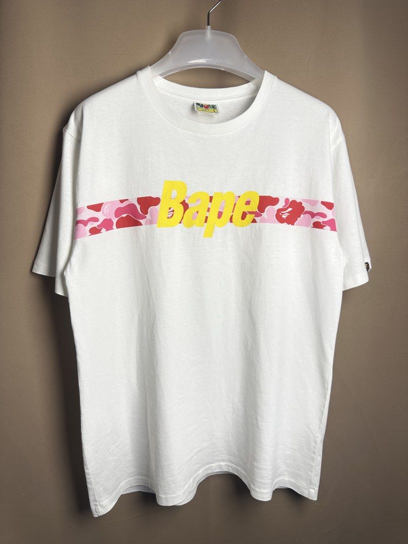 Bape Tape Camo Logo Tee (Category: Tshirts & Polo Shirts ) located in Marikina City. Submitted by swiftsian (Listing ID 1467935681, Image 1). Description: Authentic Bape Tape Camo Logo Tee (White) - Size: Large - Issue: None - Manage your expectations. Some issues may not be seen or indicated. - Color may vary due to lighting Shipping: Lalamove/J&T .
