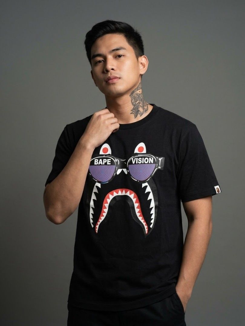 BAPE vision shark black Tee (Category: Tshirts & Polo Shirts ) located in Quezon City. Submitted by wgapparel (Listing ID 1468018340, Image 1). Description: 📌 available 20 x 26 W/L ( medium on tag ) Brand new condition Complete tags Orig 💯 Color rate 10/10 No issue 💰 Mine 2490 * Color may vary due to lighting * Always check posted pics for details * DM for any concerns about the item 📩Dm to purchase Disclaimer: I'm not associated or affiliate