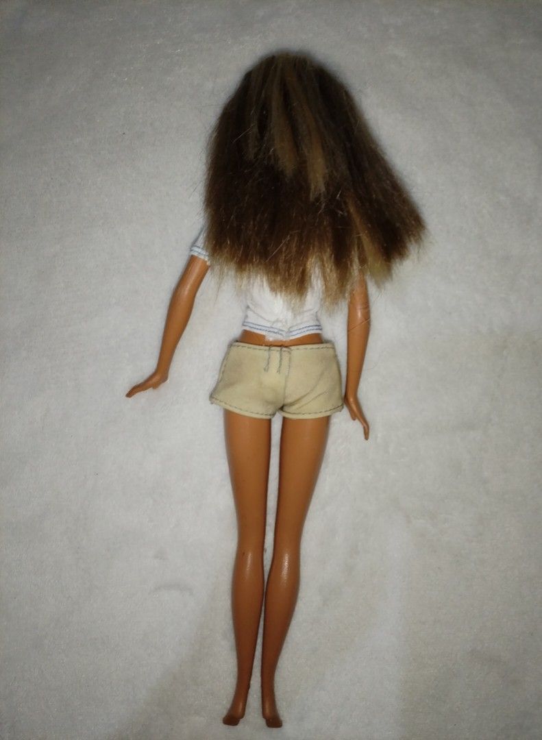Barbie Cali Girl (Category: Kids Toys) located in Goa. Submitted by liz1104 (Listing ID 1467956322, Image 3). Description: Authentic Mattel produced doll. no cracked neck rubber legged Needs hair spa Has minimal scratches on left hand Gcash First to pay Sf on buyer's expense.