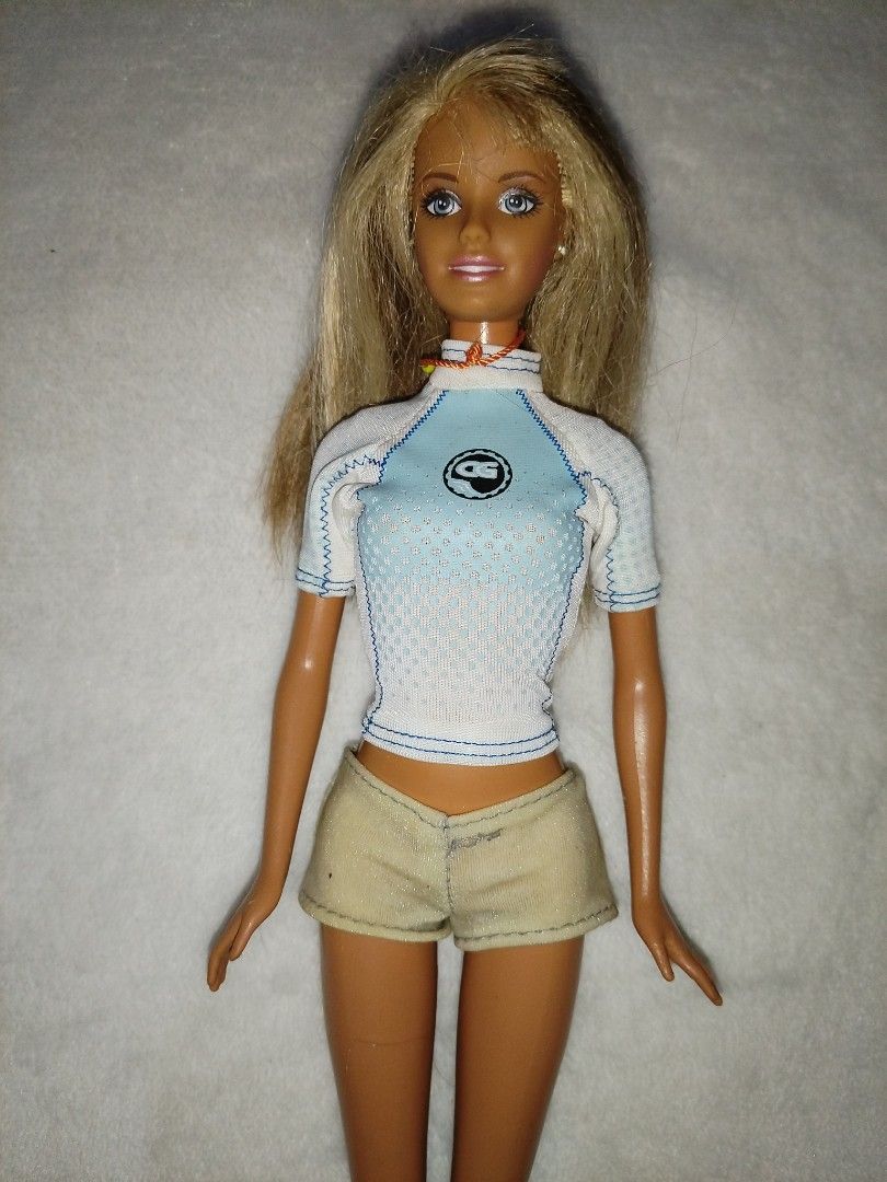 Barbie Cali Girl (Category: Kids Toys) located in Goa. Submitted by liz1104 (Listing ID 1467956322, Image 2). Description: Authentic Mattel produced doll. no cracked neck rubber legged Needs hair spa Has minimal scratches on left hand Gcash First to pay Sf on buyer's expense.