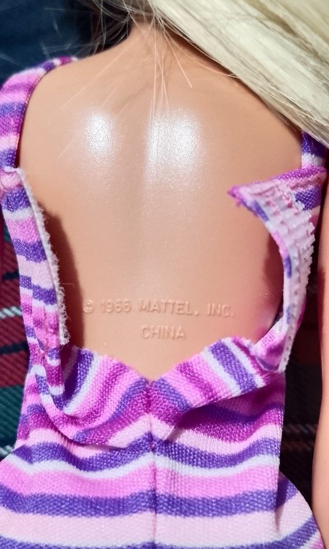 Barbie Mattel Doll - 1966 (Category: Vintage Collectibles) located in Manila. Submitted by amomof3at41 (Listing ID 1467899283, Image 3). Description: vintage Barbie Mattel Doll - 1966 purple and pink striped outfit / dress with comb and shoes almost 12 inches long.