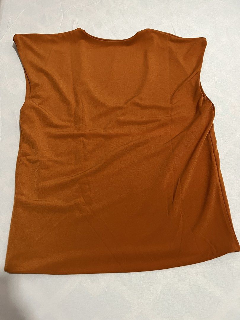 Basic Sleeveless Blouse (Category: Sleeveless) located in Tanza. Submitted by vhies_closet24 (Listing ID 1467886863, Image 3). Description: Basic Sleeveless Blouse – Minimalist Style Details: * Style: Basic sleeveless blouse * Design: Simple and versatile * Comfortable for everyday wear, office outfits, or casual styling * Easy to mix and match with different bottoms * Condition: Please see actual photos.