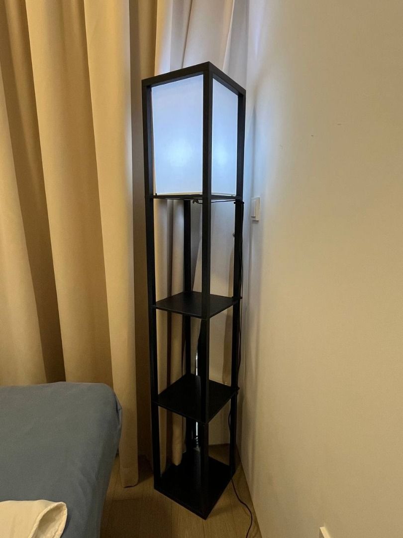 Bedside table/lighting (Category: Tables & Sets) located in Singapore. Submitted by panda808 (Listing ID 1467931663, Image 3). Description: 1. Bedside Table (Height 70cm x Length 45cm x Width 30cm) - The height of each open compartment is about 20cm, which I found very convenient for keeping books, my phone, remote controls, etc. 2. Bedside Table (Height 50cm x Length 39cm x Width 31cm) - Fits A4-sized books. 3. Standing Floor Lamp (Height 160cm 