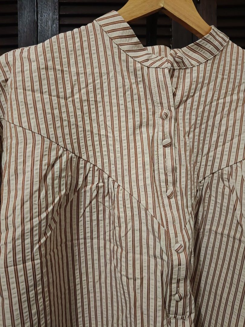 Beige stripes button down (Category: Longsleeves) located in Manila. Submitted by byjrb (Listing ID 1468038991, Image 2). Description: 🛍️ Brand-new items from SHEIN, Emery Rose, Zaful & more! Size : XL 📦 Shipping: LBC / J&T / Lalamove 💸 MOP: GCash / BPI only DM for inquiries! 💌.
