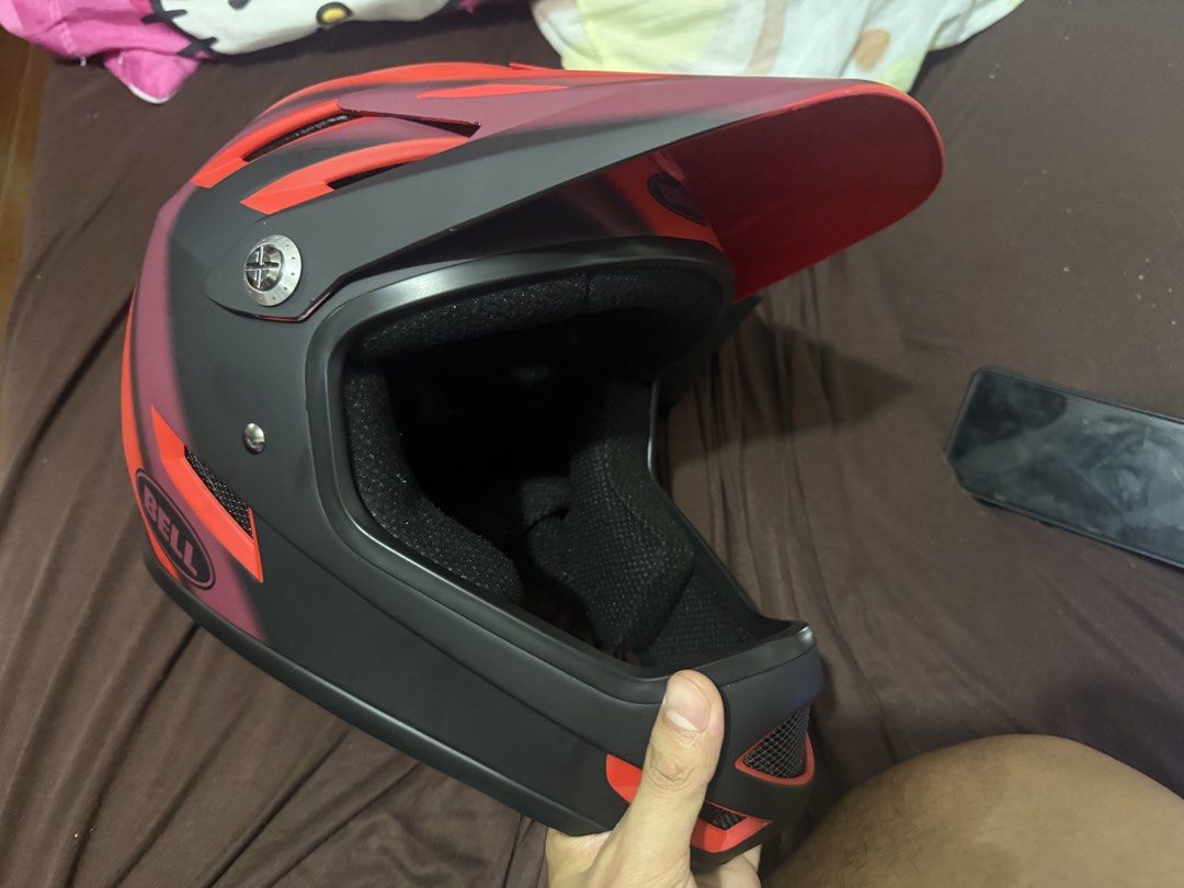 Bell sanction Full-Face Bicycle Helmet Size MD (Category: Bicycles) located in Manila. Submitted by arelef (Listing ID 1468024871, Image 1). Description: - Brand: Bell Full-Face Helmet - Colorway: Red and Black with a sleek matte finish - Size: Medium (MD) - Condition/Inclusions: Comes with original Bell storage bag and instruction manual - Features: Full face protection design with multiple top and rear ventilation slots - Ideal for: Downhill mo