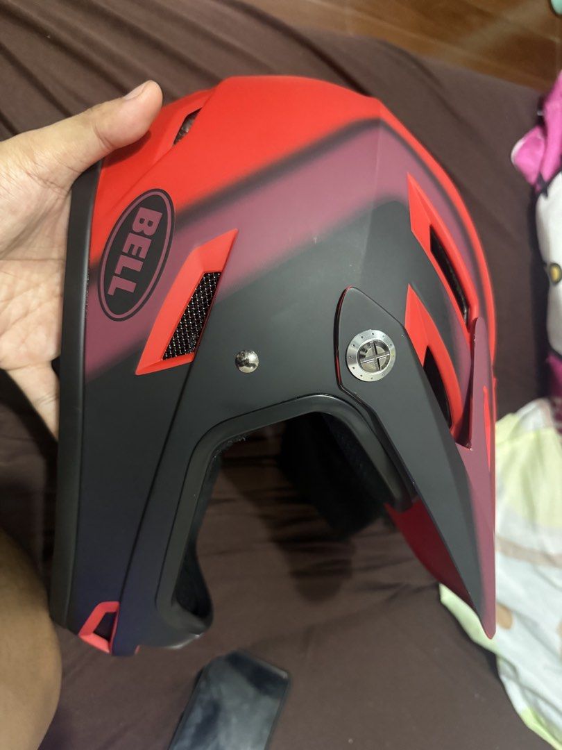 Bell sanction Full-Face Bicycle Helmet Size MD (Category: Bicycles) located in Manila. Submitted by arelef (Listing ID 1468024871, Image 3). Description: - Brand: Bell Full-Face Helmet - Colorway: Red and Black with a sleek matte finish - Size: Medium (MD) - Condition/Inclusions: Comes with original Bell storage bag and instruction manual - Features: Full face protection design with multiple top and rear ventilation slots - Ideal for: Downhill mo