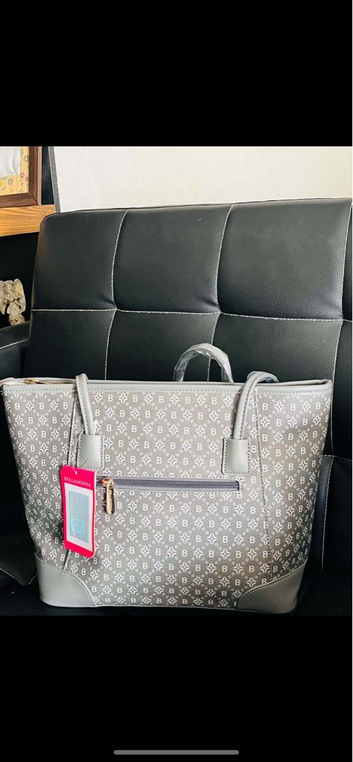 Belladonna Grey Monogram Tote Bag (Category: Tote Bags) located in Malolos. Submitted by magnoannchrstn (Listing ID 1467932015, Image 2). Description: - Brand: Belladonna - Style: Tote bag in stylish grey monogram print - Details: Solid grey trim, gold-tone hardware with front branded plaque, and pink side tag - Handles: Double top handles with protective plastic wrap still intact - Pockets: Rear exterior zip pocket for quick access - Closure: Se