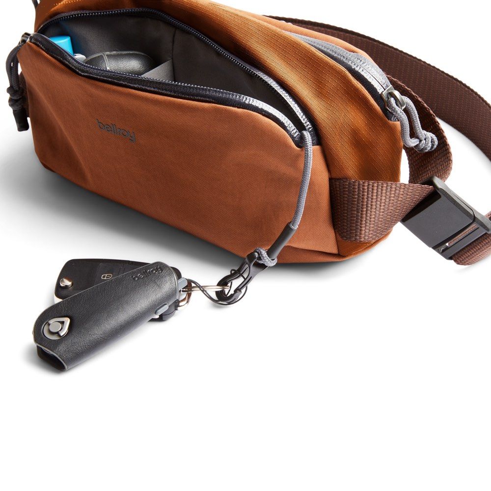 Bellroy Venture Ready Sling 2.5L (Category: Sling Bags) located in Digos. Submitted by dmark88 (Listing ID 1467943997, Image 2). Description: - Brand: Bellroy - Model: Venture Ready Sling - Color: Bronze - Capacity: 2.5L - Weight: 200g - Condition: Brand new with original tag attached, unused and pristine - Features: Integrated key clip, dual-directional zips for easy access - Material: Eco-friendly recycled materials - Ideal for: Outdoor use and