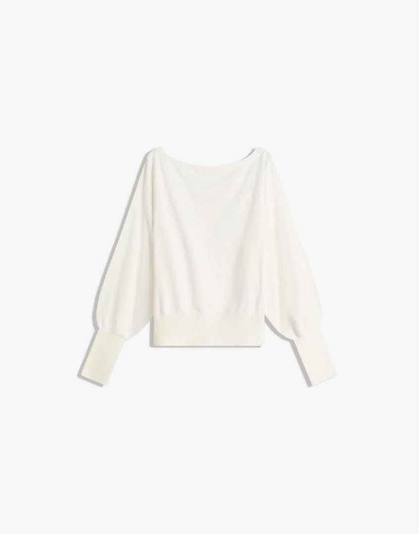 Bershka Asymmetric Off Shoulder Sweater (Category: Longsleeves) located in Pasig City. Submitted by luckyvicky_ (Listing ID 1467913369, Image 2). Description: - Color: White - Style: Off-shoulder neckline with a slouchy fit - Sleeves: Long sleeves with wide ribbed cuffs - Hem: Fitted ribbed hem - Material: Soft, comfortable fabric - Versatility: Perfect basic piece; easy to pair with shorts, jeans, or trousers.