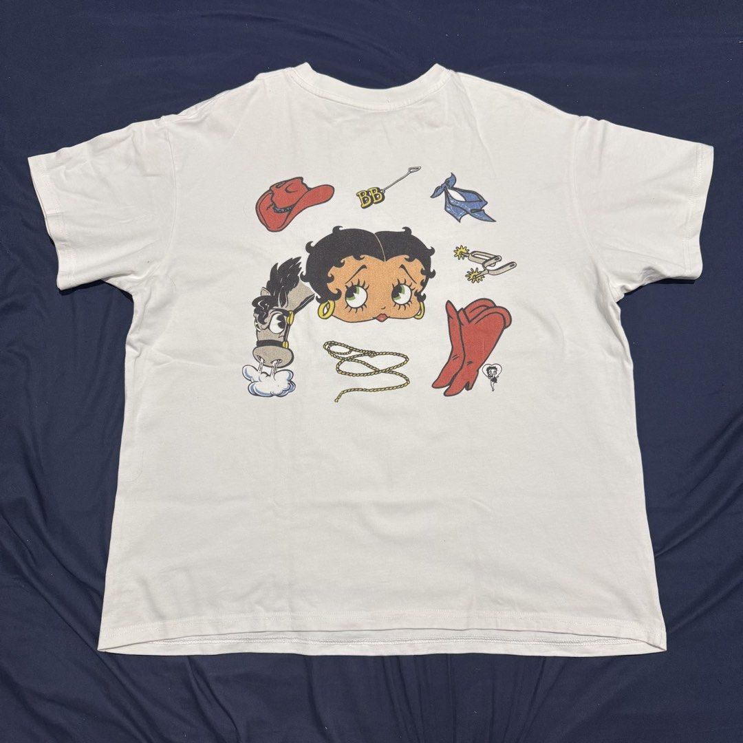 Betty boop shirt (Category: Shirts) located in Quezon City. Submitted by mixpickz.qc (Listing ID 1468041190, Image 2). Description: Cut tag 9/10 color rate 23.5/27.5 Signs of usage .