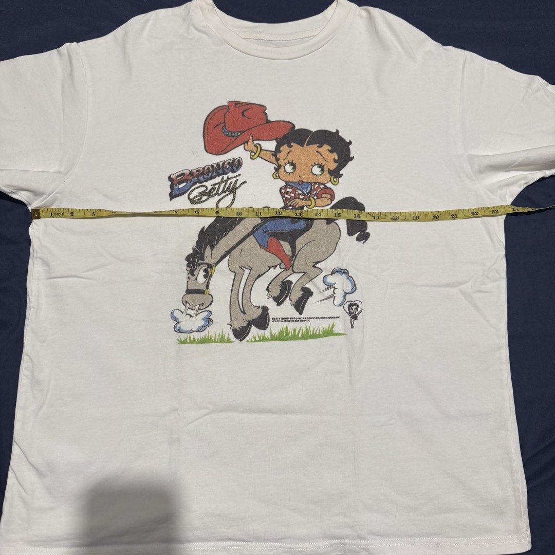 Betty boop shirt (Category: Shirts) located in Quezon City. Submitted by mixpickz.qc (Listing ID 1468041190, Image 3). Description: Cut tag 9/10 color rate 23.5/27.5 Signs of usage .