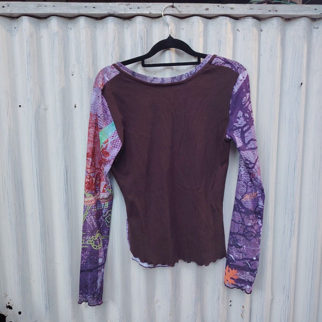 Beyonce Y2K Graphic Print Long Sleeve Mesh Top (Category: Longsleeves) located in Manila. Submitted by maetots (Listing ID 1467932268, Image 2). Description: - Style: Y2K graphic mesh top - Colorway: Purple and brown with leaf and text accents - Design: Scoop neckline and trendy lettuce hem details - Materials: 100% polyester front with a soft ribbed brown back - Fit: Unique layering piece, perfect for effortless styling.
