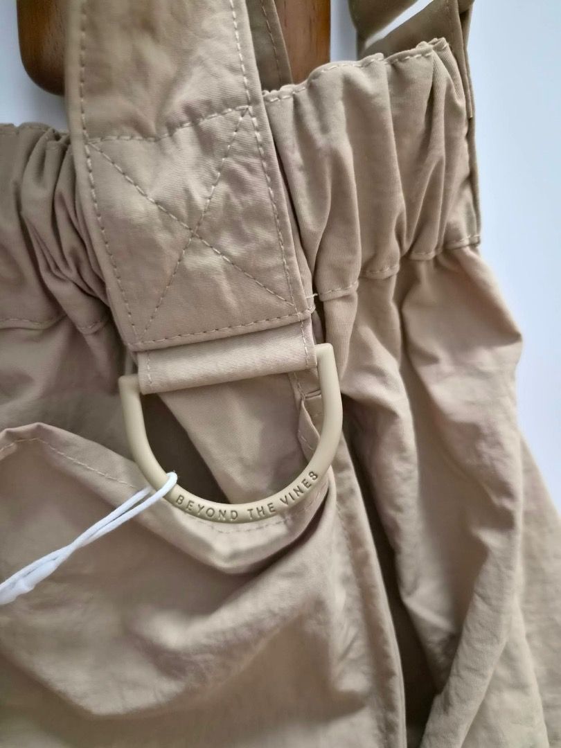 Beyond the Vines (Category: Cross-body Bags) located in Manila. Submitted by romille12345 (Listing ID 1468011643, Image 3). Description: Brand New BTV. XS Dumpling in Khaki..
