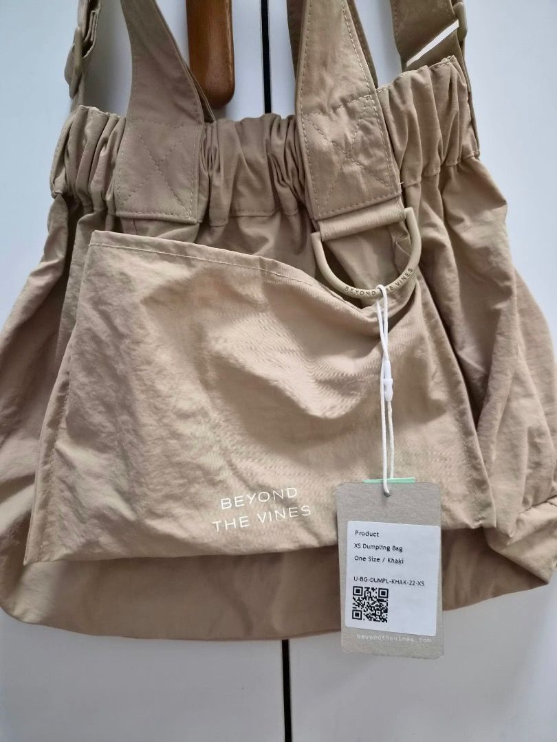 Beyond the Vines (Category: Cross-body Bags) located in Manila. Submitted by romille12345 (Listing ID 1468011643, Image 2). Description: Brand New BTV. XS Dumpling in Khaki..