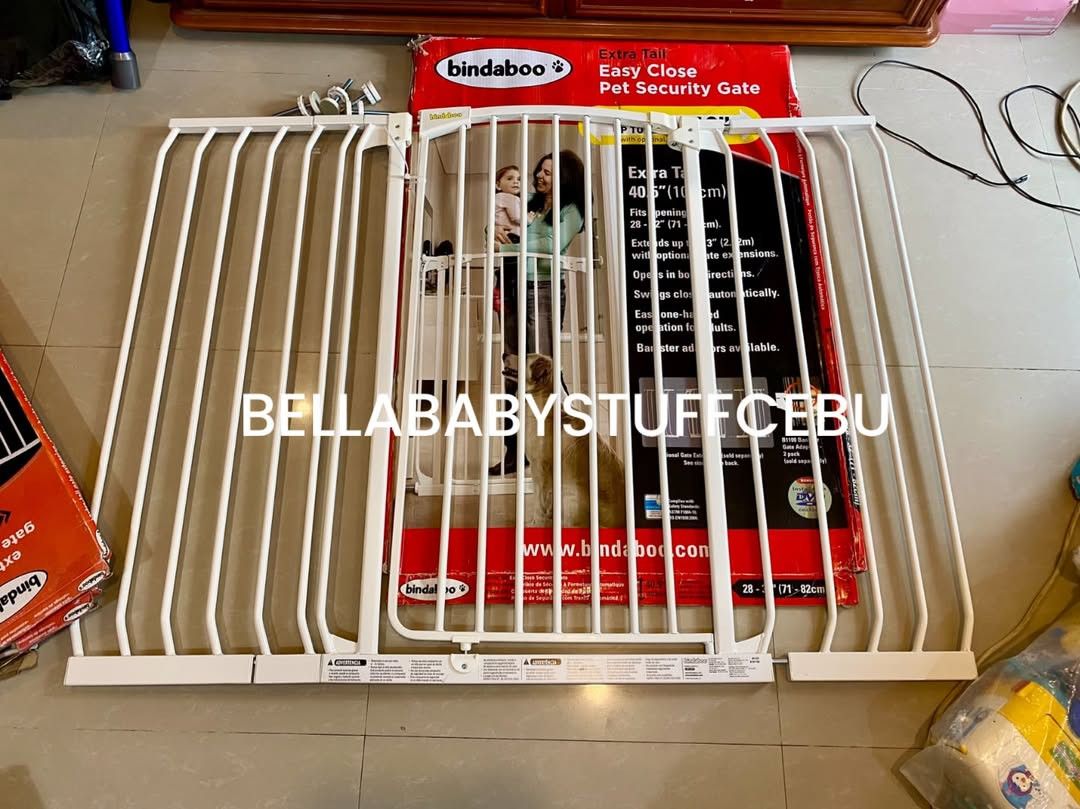 Bindaboo Extra Tall Safety Gate with 3 Extensions Good as New (Category: Safety Gates, Locks & Protectors) located in Cebu City. Submitted by bellababystuffcebu (Listing ID 1467940642, Image 2). Description: Bindaboo Extra Tall Safety Gate with 3 Extensions Good as New Extra Tall Hallway Gate: 40.5 inch H (103cm) Fits to openings 71-82cm Available Extensions fits to opening up to 145cm 2pcs 27cm 1pc 9cm Auto close gate opens in both directions JP