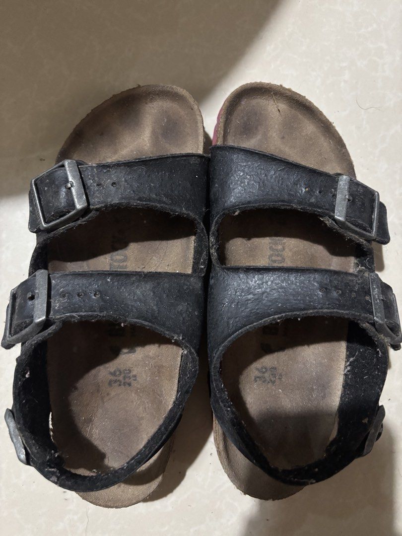 Birkenstock Black Leather Sandals Size 36 (Category: Flats & Sandals) located in Rodriguez. Submitted by eyahhhkm (Listing ID 1467857718, Image 1). Description: - Brand: Birkenstock - Style: Black leather sandals with secure back straps - Size: 36 (Regular Width) - Features: Adjustable metal buckles, signature cork footbed (with visible wear/foot imprints), durable red rubber outsole - Origin: Made in Germany - Condition: Pre-loved with signs of 