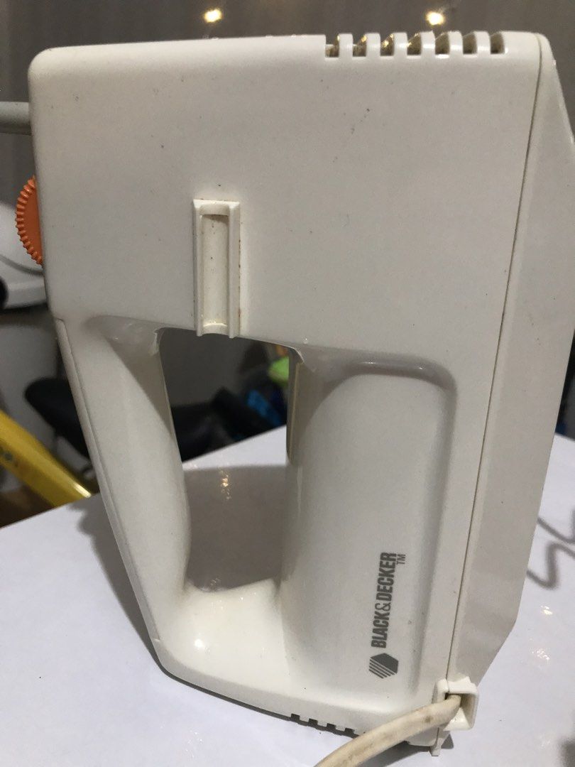 Black & Decker Hand Mixer with Beaters and Dough Hooks (Category: Hand & Stand Mixers) located in Taytay. Submitted by laine2023 (Listing ID 1468017475, Image 2). Description: - Brand: Black & Decker electric hand mixer (White) - Inclusions: 2 standard beaters (still in plastic wrapping) and 2 spiral dough hooks - Features: Convenient speed control wheel located on top of the handle - Condition: Fully functional with normal signs of previous kitc