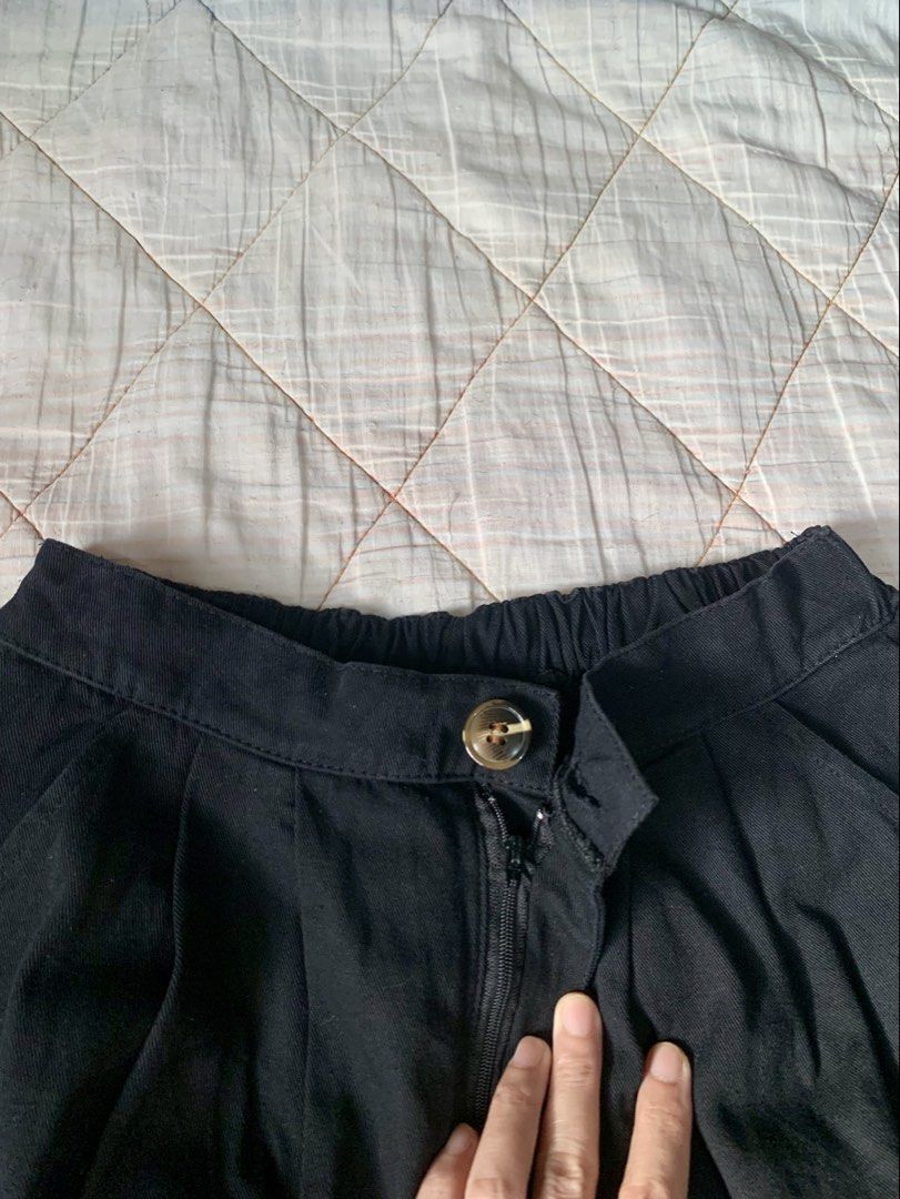 Black A-line Midi Denim Skirt with Front Button (Category: Skirts) located in Bacoor. Submitted by krisery (Listing ID 1467959618, Image 3). Description: - Color: Solid Black - Waist: 24-28 inch - Stretchable waistband at the back - Length: 29 inch - Bottom Width: 32.5 inch (flat-lay) - Style: Midi skirt with a nice, structured flare - 2 Side Pockets - Closure: Front button with a hidden zip fly - Color Rate: 10/10 - No Damage - Good as New.