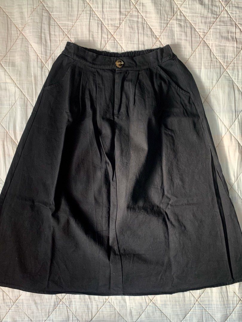 Black A-line Midi Denim Skirt with Front Button (Category: Skirts) located in Bacoor. Submitted by krisery (Listing ID 1467959618, Image 2). Description: - Color: Solid Black - Waist: 24-28 inch - Stretchable waistband at the back - Length: 29 inch - Bottom Width: 32.5 inch (flat-lay) - Style: Midi skirt with a nice, structured flare - 2 Side Pockets - Closure: Front button with a hidden zip fly - Color Rate: 10/10 - No Damage - Good as New.