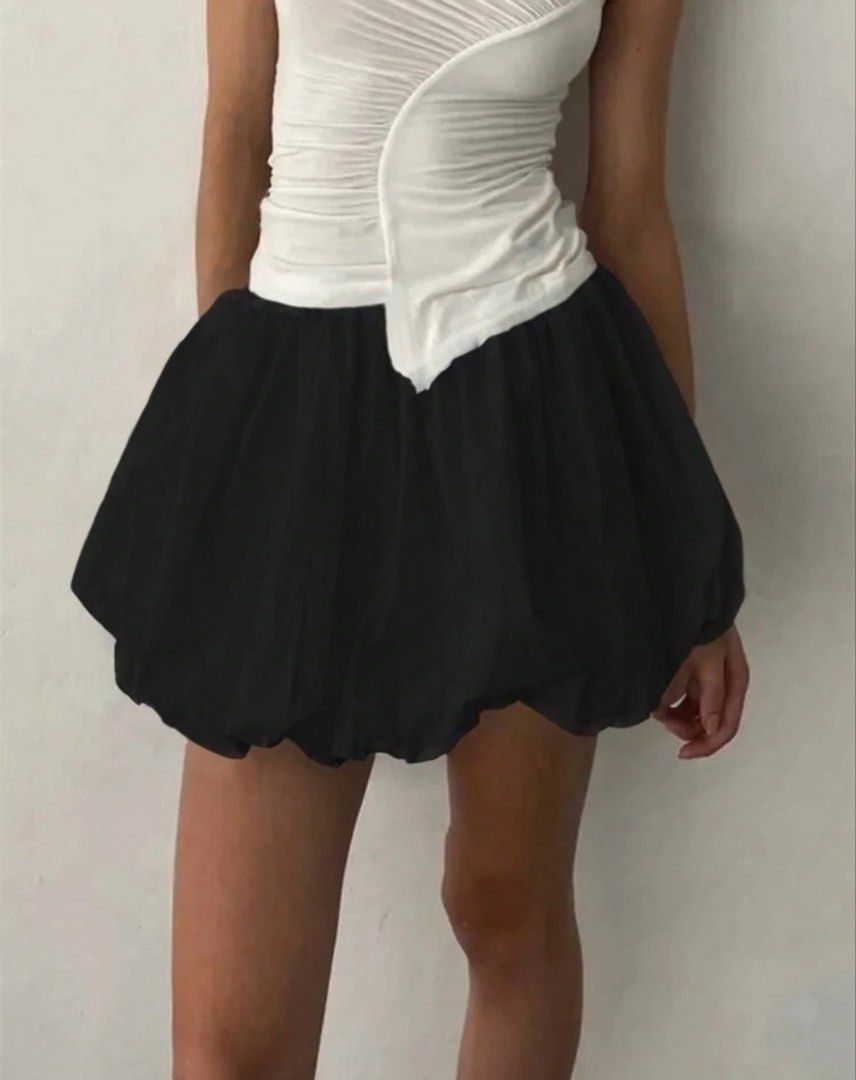Black Bubble Skirt (Category: Skirts) located in Dasmarinas. Submitted by littleczarmer (Listing ID 1467958855, Image 1). Description: - used once - can fit s to semi l - Style: Bubble skirt with comfortable elastic waistband - Material: Lightweight fabric.