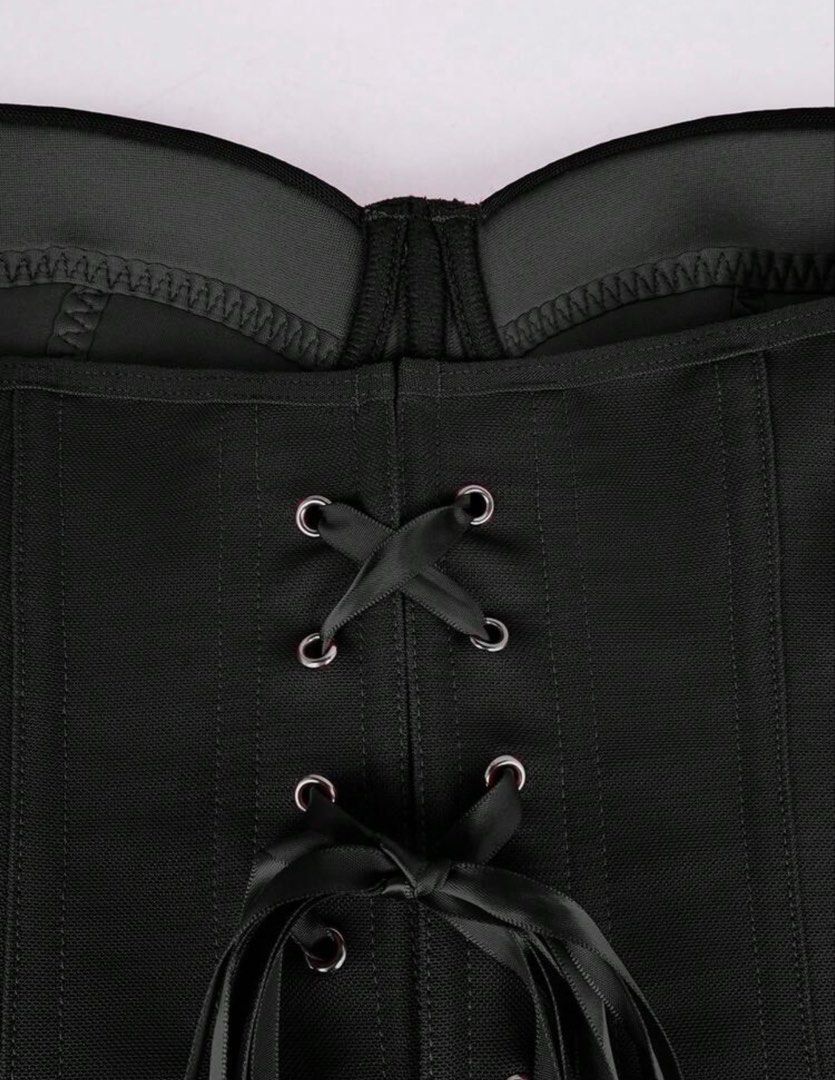 Black Corset Top Structured Bustier Lace-up Back (Category: Sleeveless) located in Makati City. Submitted by t62024x (Listing ID 1467886469, Image 2). Description: - Color: Black - Style: Strapless sweetheart neckline with structured molded cups - Support: Built-in boning structure in the front and sides - Back Detail: Adjustable lace-up design with black ribbon and metal eyelets - Finish: Solid fabric throughout the body - Condition: Brand new /