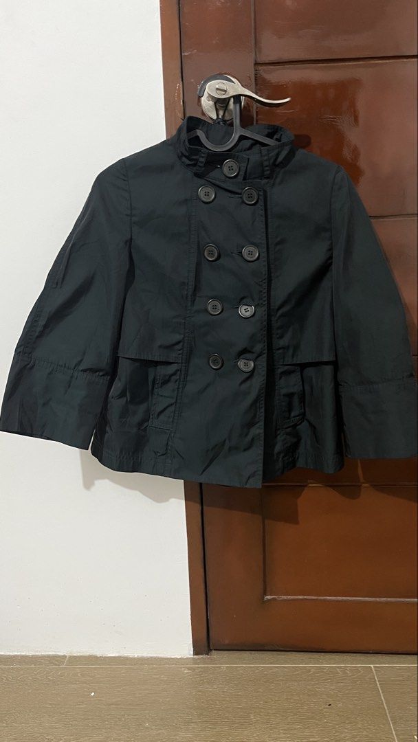 Black Double Breasted Cropped Trench Jacket (Category: Coats, Jackets and Outerwear) located in Cebu City. Submitted by minymal (Listing ID 1467882476, Image 1). Description: - Color: Black - Style: Double-breasted, cropped fit (falls above the hips) - Sleeves: Three-quarter length - Details: High collar, dark front buttons, structured lines - Material: Lightweight fabric - Condition: Excellent, clean look - Perfect for: Easy matching and stylish
