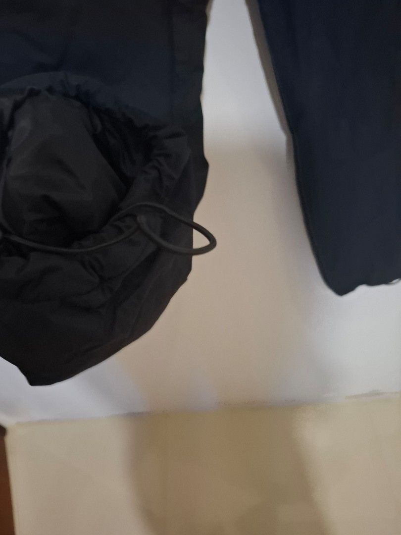 Black Fleece Lined Winter Pants with Drawstring Cuffs, waterproof (Category: Babies & Kids Fashion) located in Imus. Submitted by maggieforce (Listing ID 1467934118, Image 2). Description: - worn by my 7Y son (33 to 34kg) - Color: Solid black with a warm grey fleece interior lining - Closure: Elastic waistband with a secure snap button - Pockets: Convenient zippered side pockets for small essentials - Protection: Drawstring adjustable ankles to s