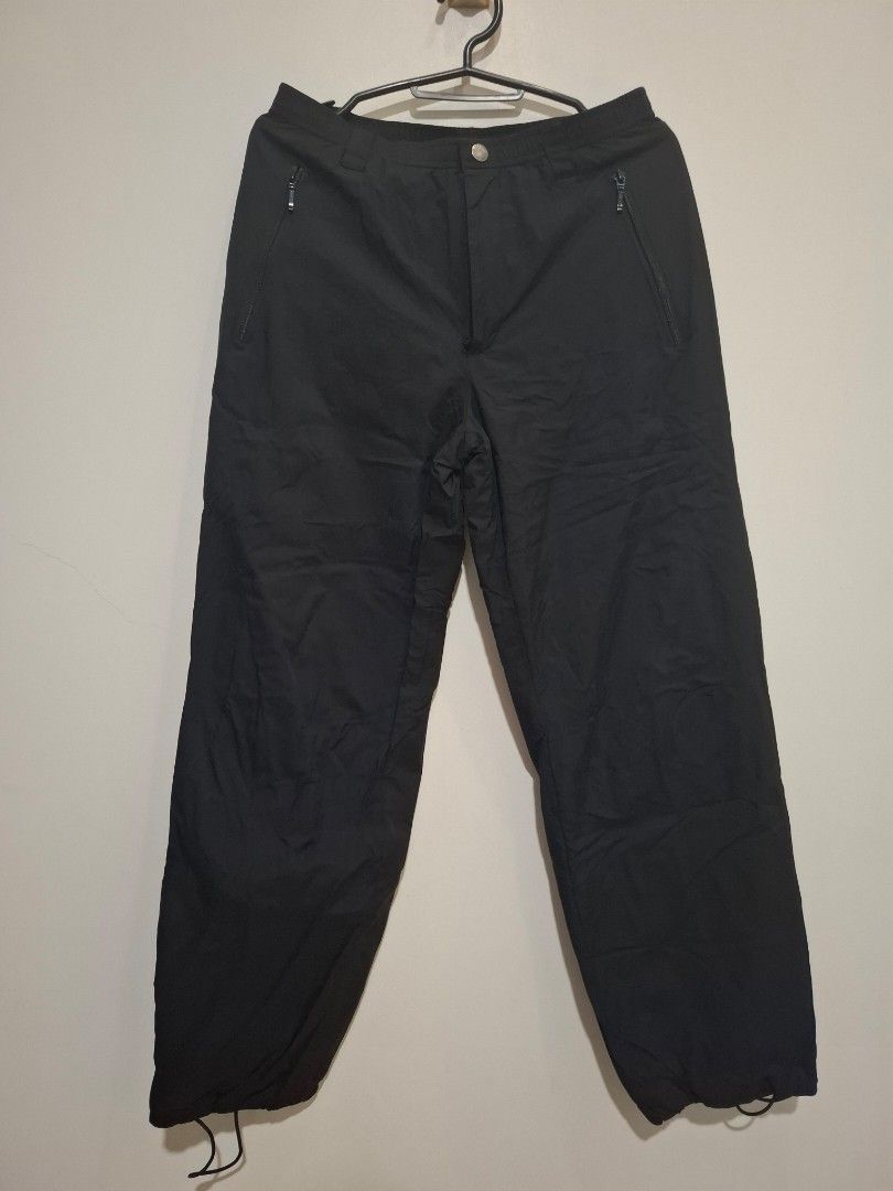 Black Fleece Lined Winter Pants with Drawstring Cuffs, waterproof (Category: Babies & Kids Fashion) located in Imus. Submitted by maggieforce (Listing ID 1467934118, Image 1). Description: - worn by my 7Y son (33 to 34kg) - Color: Solid black with a warm grey fleece interior lining - Closure: Elastic waistband with a secure snap button - Pockets: Convenient zippered side pockets for small essentials - Protection: Drawstring adjustable ankles to s