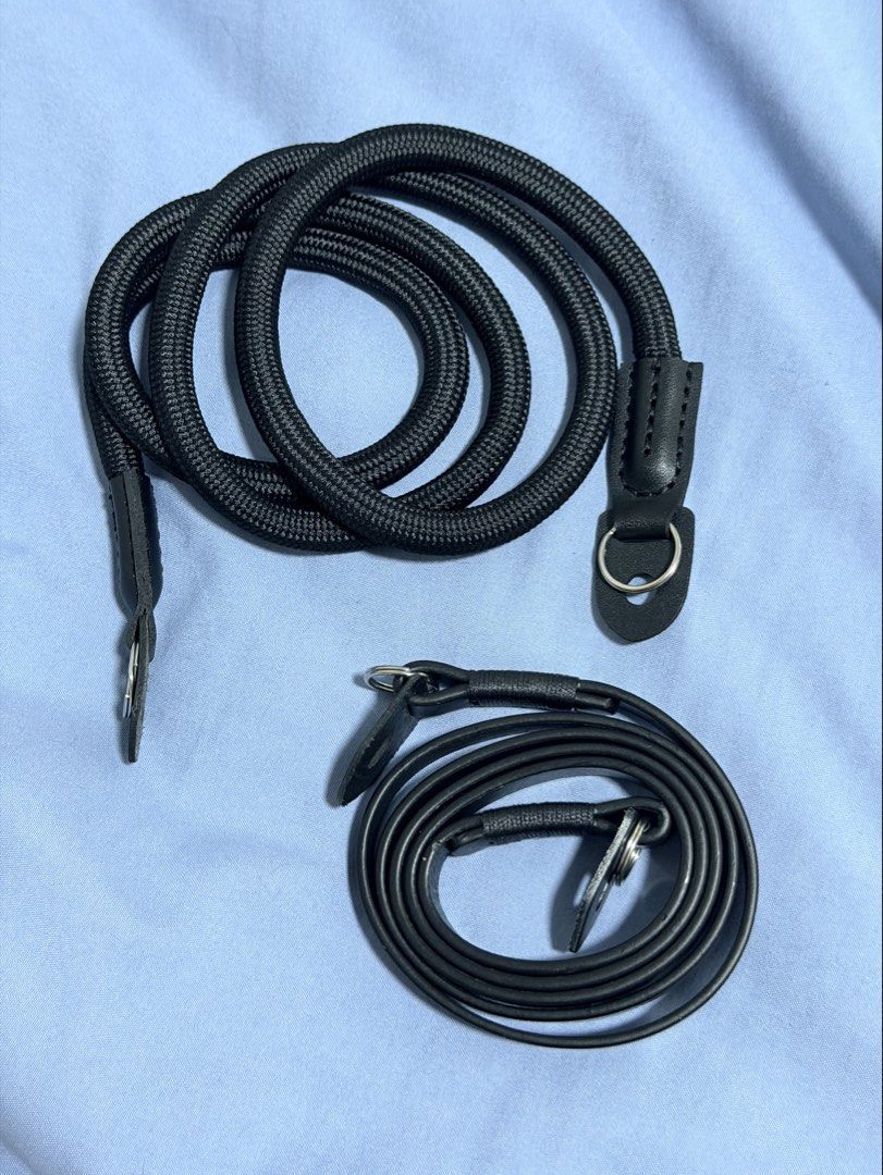 Black Leather Camera Strap (Compatible with Fujifilm X100VI) (Category: Camera Bags & Carriers) located in Quezon City. Submitted by leighdeclutters (Listing ID 1467887033, Image 3). Description: - Sleek black leather camera strap (98/115cm L x 1cm) - Sturdy metal hardware with protective leather tabs - Slim, comfortable profile for neck or shoulder wear - Secure fit for rangefinder and mirrorless cameras - Dependable grip and high-quality build 
