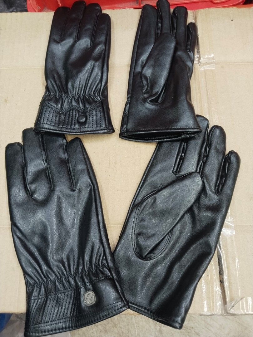Black leather gloves pair (Category: Gloves) located in Manila. Submitted by zdmal (Listing ID 1467862978, Image 2). Description: - Color: Classic Black - Material: Soft, high-quality leather with a clean interior and exterior finish - Design: Elegant gathered wrist detailing with a stylish snap button accent near the cuff - Sizing: Available in two sizes for a comfortable fit - Versatility: Ideal for cool weather riding or daily winter wear.