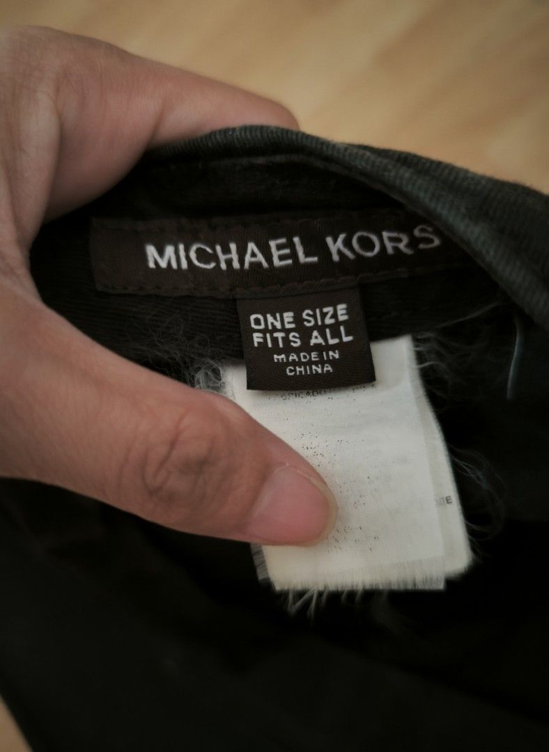 Black Michael Kors cap (Category: Caps & Hats) located in Manila. Submitted by wearforce (Listing ID 1467955397, Image 2). Description: Black Michael Kors cap with washtags color rate 10/10 no issues good condition 800 + sf.