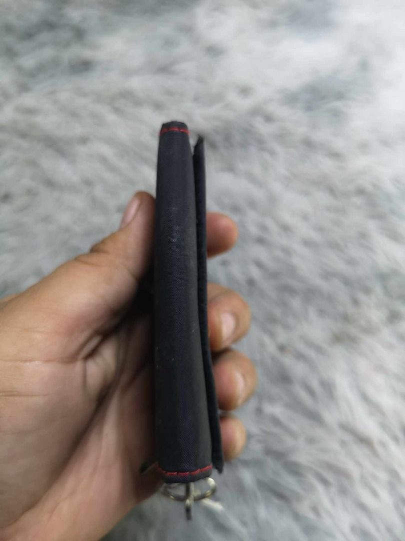 Black Snap Closure Key Wallet (Category: Wallets & Card Holders) located in Santa Cruz. Submitted by jmy_surplus.2 (Listing ID 1467994481, Image 3). Description: Size ; L - 2.6 W - 4.1 Color ; Black Type ; Key Wallet Brand ; No brand Material ; Nylon Style ; Black Durable Cute Key Wallet LG 116 JMY 3 Batch #225.