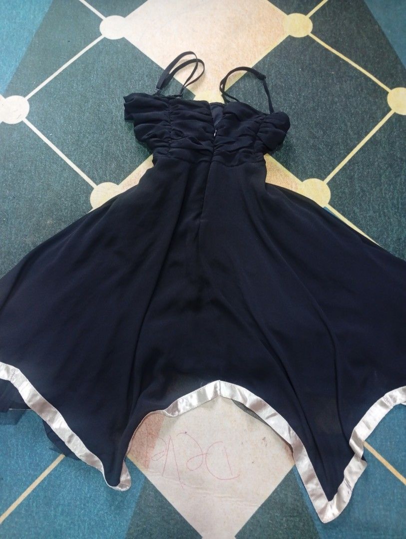 Black Spaghetti Strap Dress with Satin Hem (Category: Dresses) located in Santa Maria. Submitted by itsmacmacky (Listing ID 1467999664, Image 2). Description: Brand: Yoluk Size: 10 UK (as shown on tag) Color: Black with White/Silver Hem Style: Spaghetti Strap Flare Dress Design: Ruched Bodice / Satin-Trimmed Handkerchief Hem.
