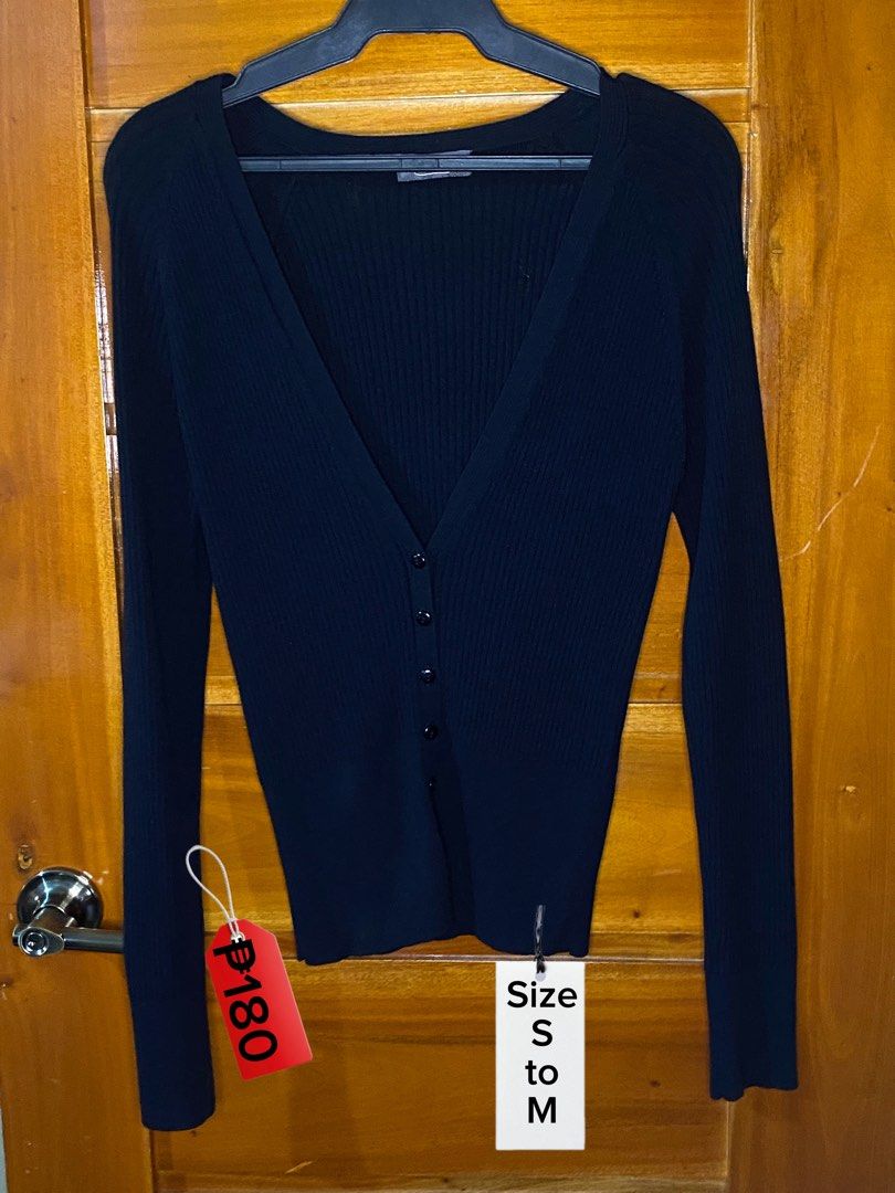 Black V-Neck Ribbed Cardigan Small to Medium (Category: Coats, Jackets and Outerwear) located in Baguio. Submitted by heath2600 (Listing ID 1468012301, Image 1). Description: - Color: Classic Black - Style: Fitted ribbed cardigan with deep V-neck and long sleeves - Closure: Button-down front with matching dark buttons - Size: Tagged S to M - Condition: Clean fabric, excellent for layering or solo wear.