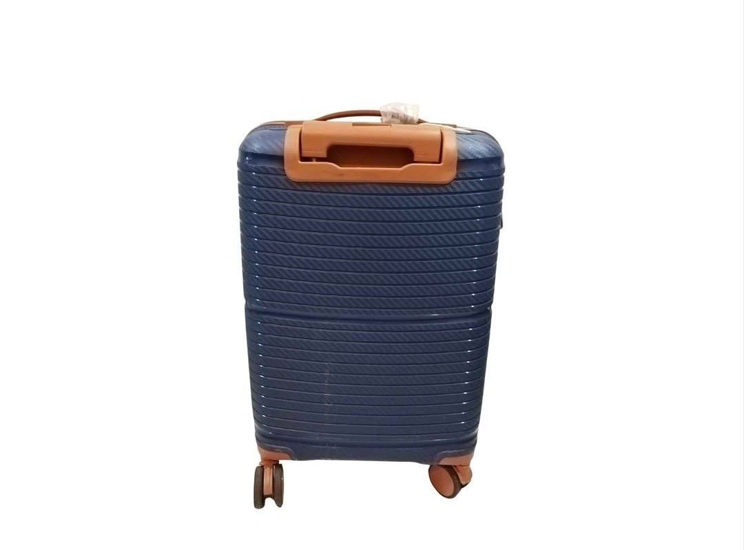 Blue and Brown Hard Shell Suitcase 360 Wheels (Category: Luggage) located in Cebu City. Submitted by krisiiiiesale (Listing ID 1468002670, Image 2). Description: - Color: Navy blue with chic brown trim accents - Material: 100% durable PP hard shell with modern ribbed texture - Mobility: Smooth 4 spinner wheels for effortless travel - Storage: Spacious interior with an expansion zipper for extra packing space - Condition: Brand new with original p