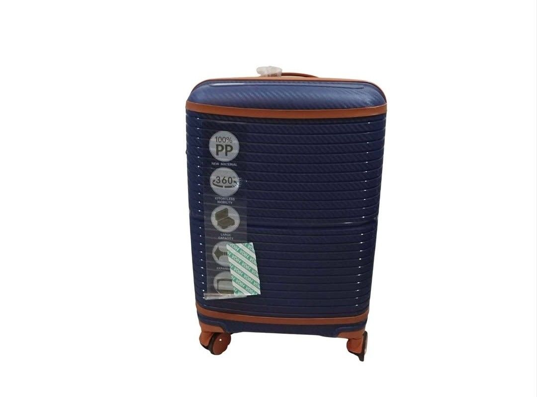 Blue and Brown Hard Shell Suitcase 360 Wheels (Category: Luggage) located in Cebu City. Submitted by krisiiiiesale (Listing ID 1468002670, Image 1). Description: - Color: Navy blue with chic brown trim accents - Material: 100% durable PP hard shell with modern ribbed texture - Mobility: Smooth 4 spinner wheels for effortless travel - Storage: Spacious interior with an expansion zipper for extra packing space - Condition: Brand new with original p