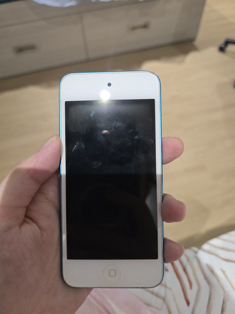 Blue Apple iPod Touch 5th Generation (Category: Portable Music Players) located in Manila. Submitted by milleshoppppp (Listing ID 1468006434, Image 1). Description: Ipod touch 5th gen Condition: good - screen, buttons, speakers, and charging port are all working well - battery needs to be replaced - with minimal dent - check photos and videos for reference - just like new (no issue in connecting in icloud) - w/free earphones Price: 2500 (still ne