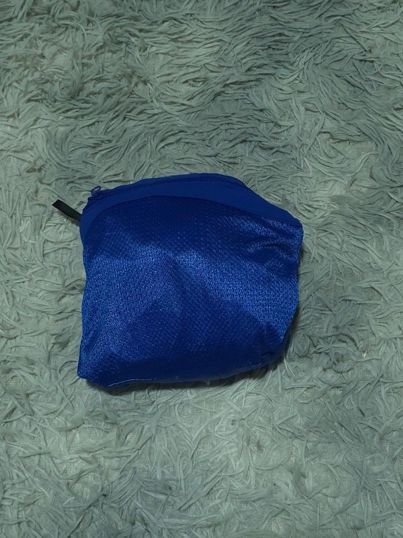 Blue Athletic Shorts with Zipper Pockets Drawstring (Category: Shorts) located in Abulug. Submitted by humanwhosellthings (Listing ID 1467880531, Image 2). Description: UNIQLO Blue Packable Short ✅Excellent Condition ✅Issue: none ▫️Waist Size: 38-42 ▫️Length: 19 - Secure storage: Zippered pockets for your phone and keys - Fit: Comfortable drawstring waist with button closure - Material: Breathable athletic fabric - Versatile use: Perfect for runn